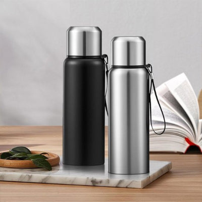 gourde isotherme en inox noir ou argent