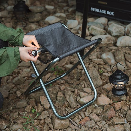 Tabouret pliable noir avec rangement 