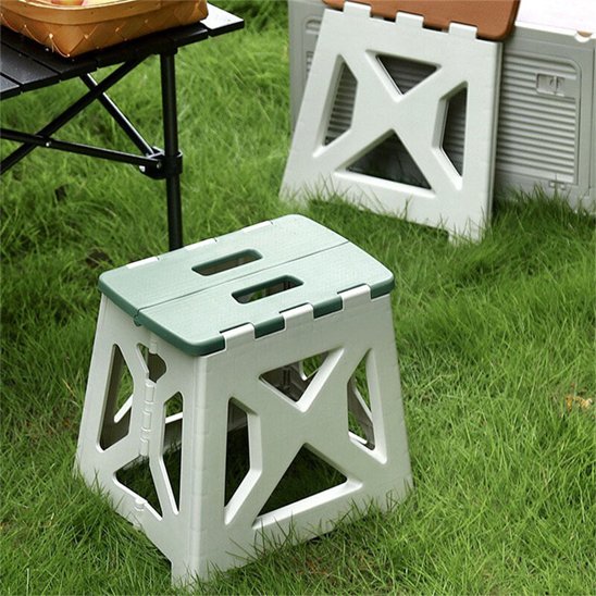 Tabouret pliable vert déplié